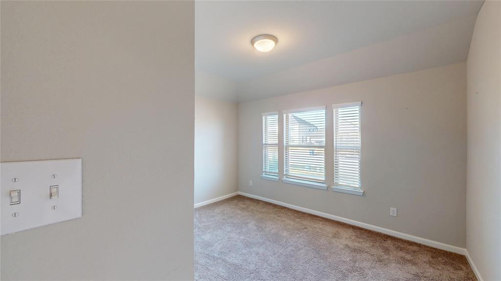 603 Cherry Hill Road Red Oak, TX 75154 - Photo 15 of 32 an empty room with windows