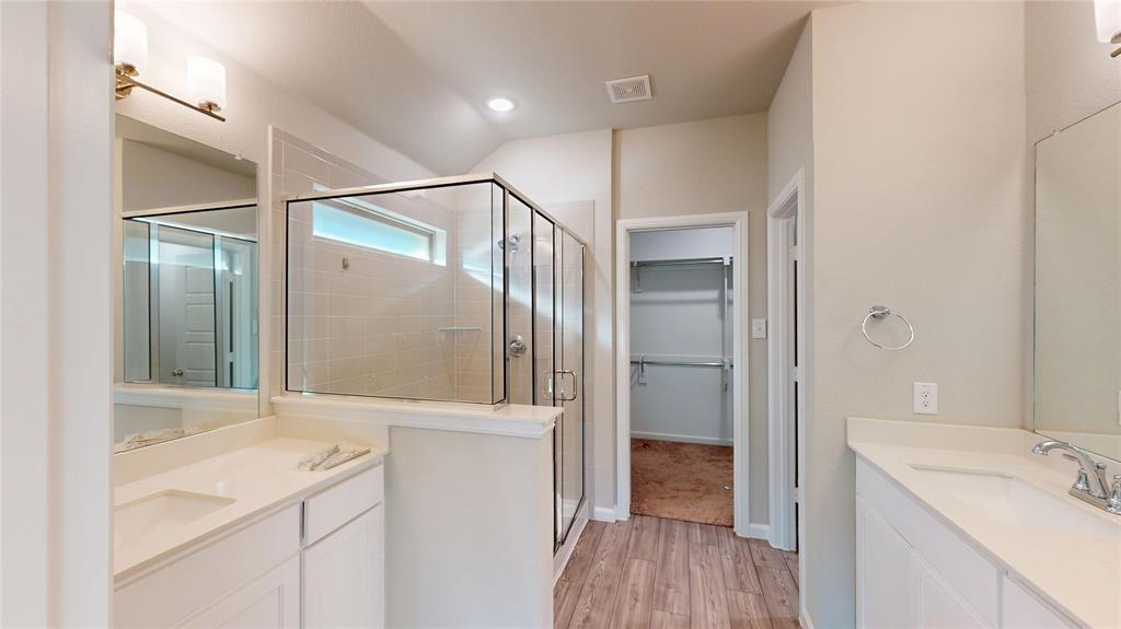 603 Cherry Hill Road Red Oak, TX 75154 - Photo 20 of 32 a bathroom with a sink and a mirror