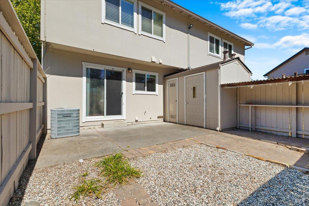 303 Algiers Court Santa Rosa, CA 95409 - Photo 22 of 27 The fenced backyard offers a storage closet and garden bench as well as room to enjoy!