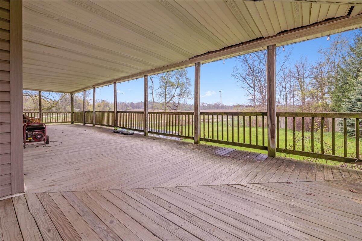 6475 Center Road Linden, MI 48451 - Photo 18 of 22 Expansive Wrap Around Porch
