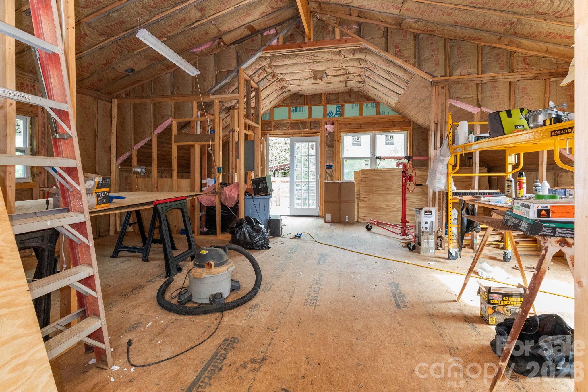 341 Sugar Hollow Road Fairview, NC 28730 - Photo 23 of 24 a view of a chairs and table in a patio