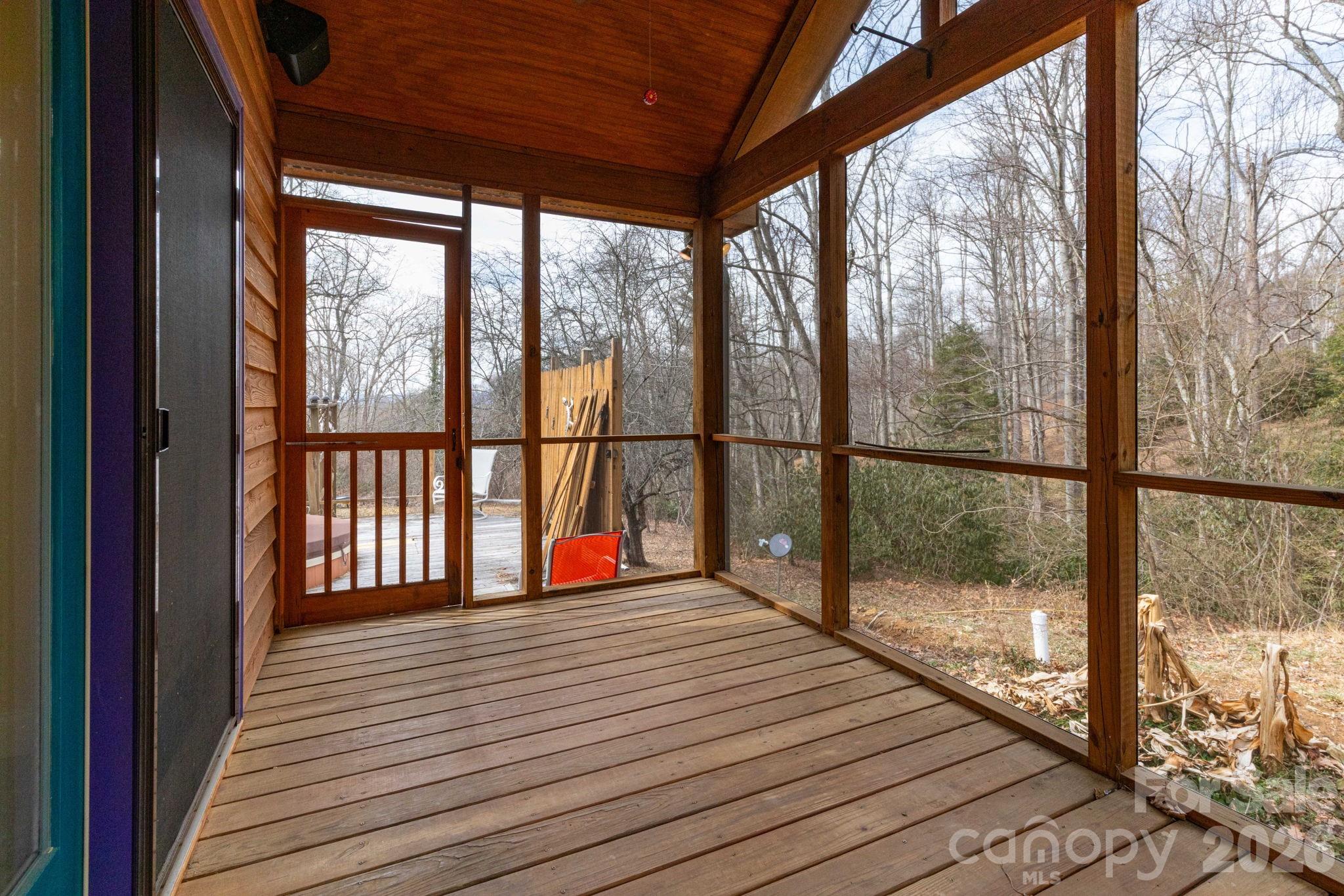 341 Sugar Hollow Road Fairview, NC 28730 - Photo 5 of 24 a view of a wooden deck