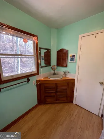 a bathroom with a shower and toilet