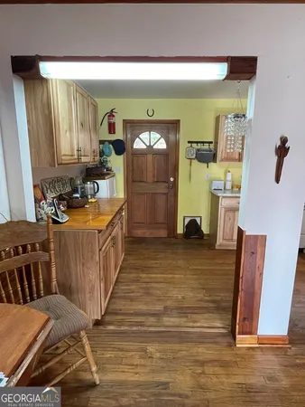 a living room with furniture window and wooden floor