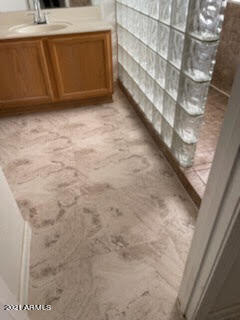 4003 West Wethersfield Road Phoenix, AZ 85029 - Photo 20 of 28 New flooring in bathroom