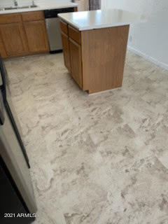 4003 West Wethersfield Road Phoenix, AZ 85029 - Photo 7 of 28 New flooring in Kitchen