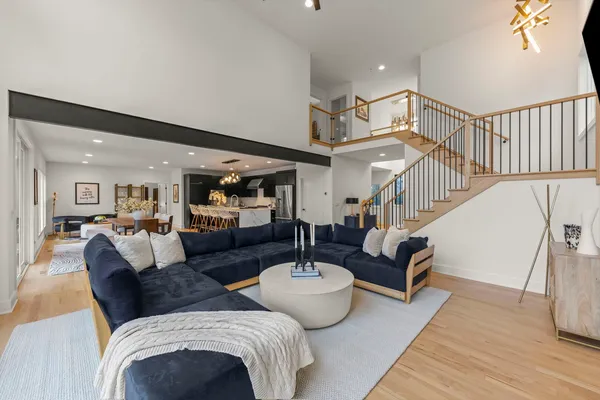 a kitchen with a refrigerator and a sink