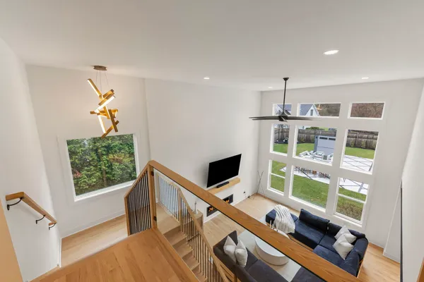 a bathroom with a bathtub and window