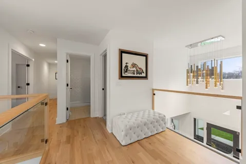 a bathroom with a shower and mirror