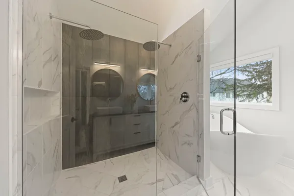 a bathroom with a sink and mirror
