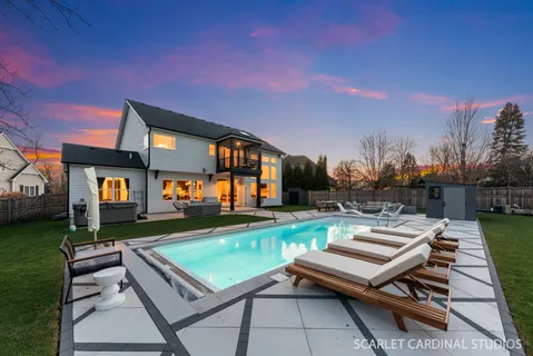 a view of a patio with dining table and chairs with a patio