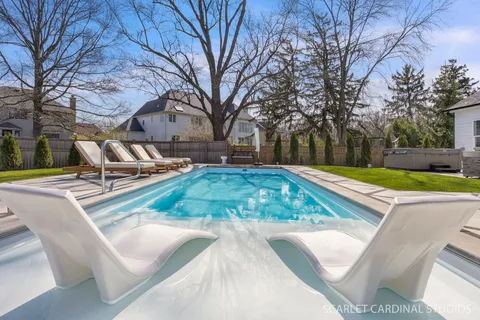 an aerial view of a house with outdoor space