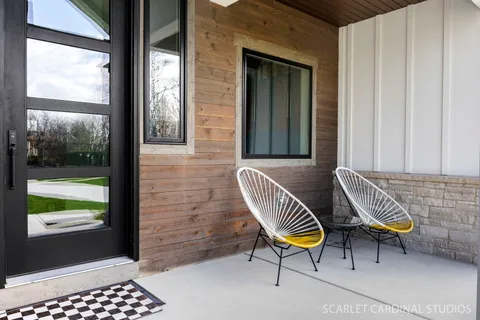 a view of a lounge chairs in the porch