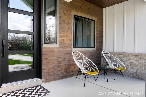 a kitchen with stainless steel appliances granite countertop lots of counter top space and wooden floor