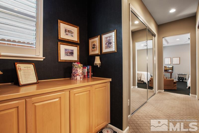 9900 Bridgeview Court Reno, NV 89521 - Photo 23 of 31 a room with mirror and furniture