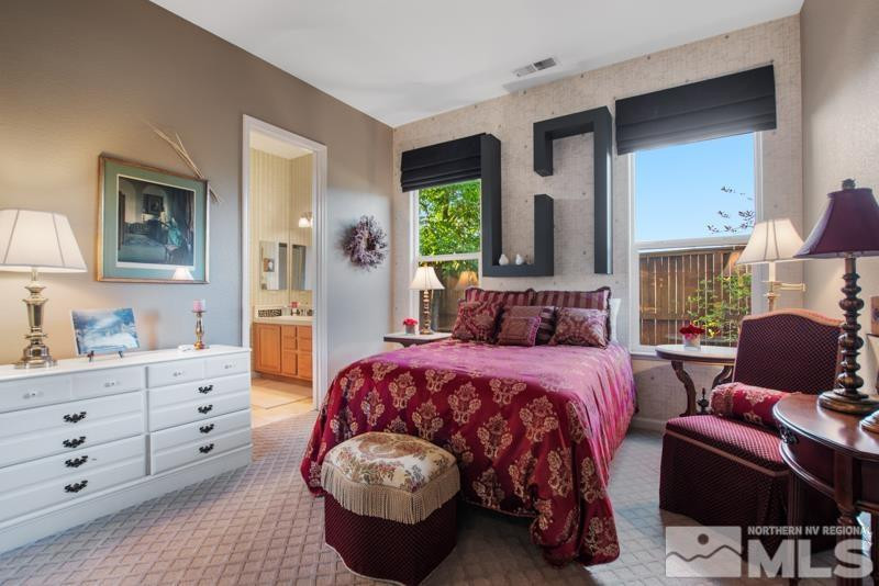 9900 Bridgeview Court Reno, NV 89521 - Photo 27 of 31 a bed room with a bed and furniture
