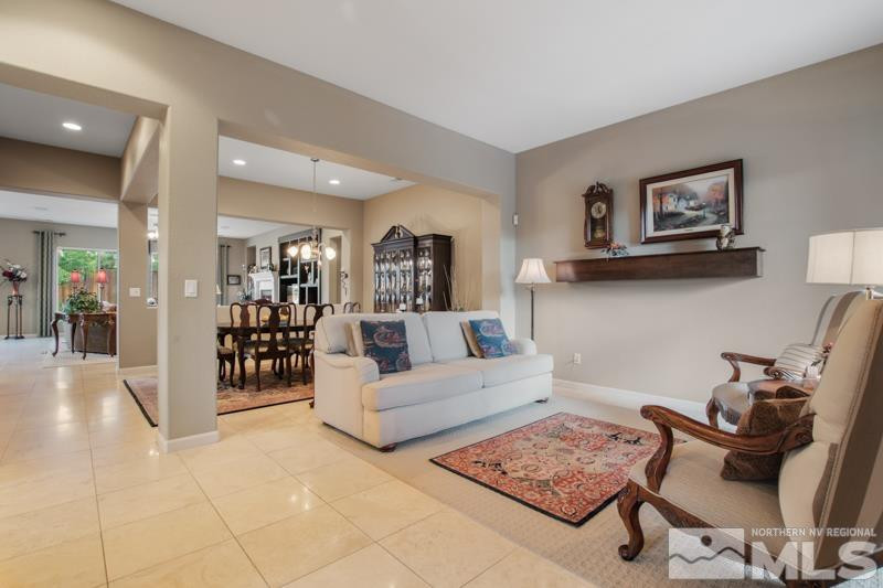 9900 Bridgeview Court Reno, NV 89521 - Photo 5 of 31 a living room with furniture and wooden floor