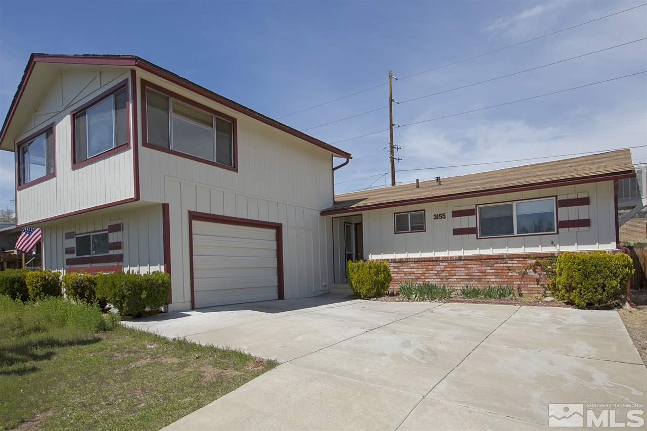 3155 Bryan Street Reno, NV 89503 - Photo 1 of 1 a front view of a house with a yard