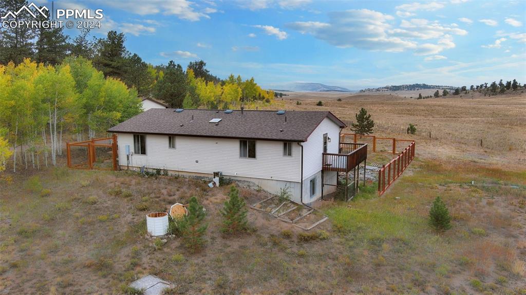 899 Concho Trail Hartsel, CO 80449 - Photo 25 of 27 a view of a house with a yard