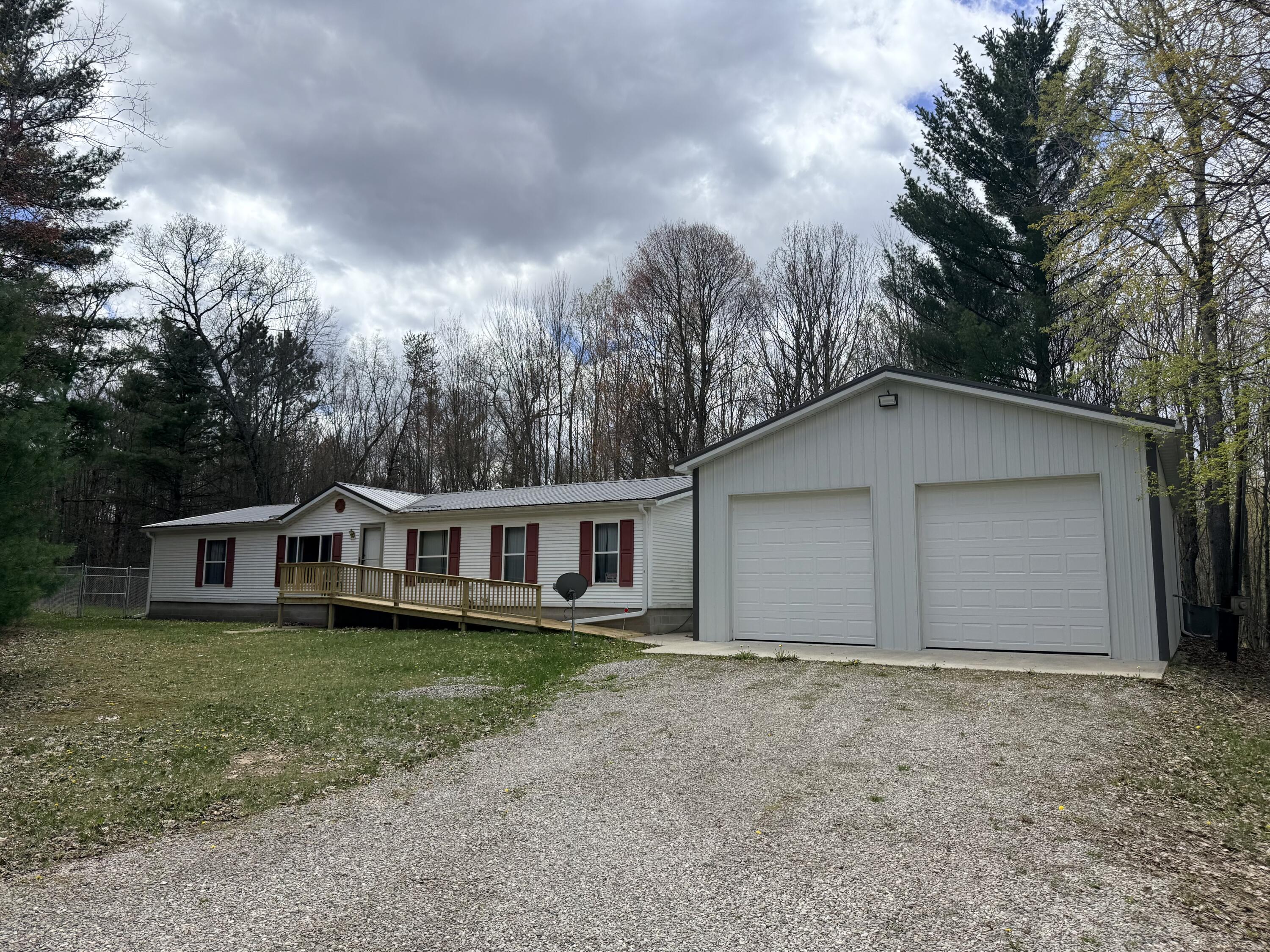 687 North Frank Smith Road Luther, MI 49656 - Photo 1 of 42 IMG_6111