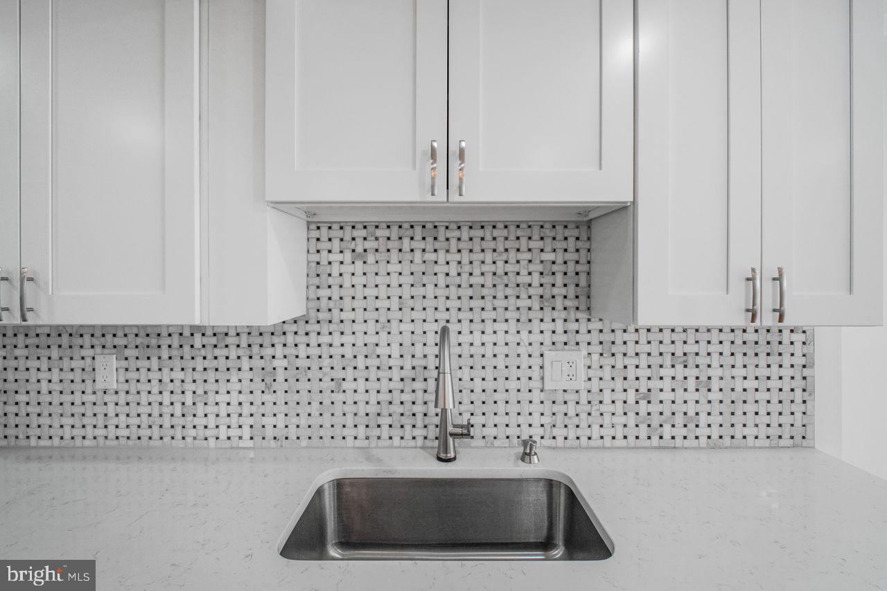 4047 Chetham Way Woodbridge, VA 22192 - Photo 16 of 55 a bathroom with a sink