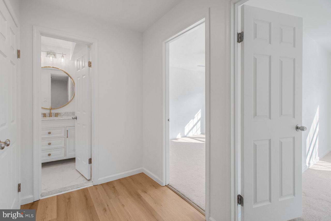4047 Chetham Way Woodbridge, VA 22192 - Photo 30 of 55 wooden floor in an entryway