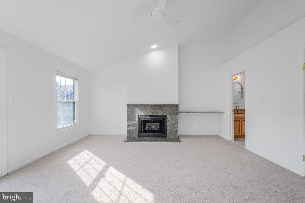 4047 Chetham Way Woodbridge, VA 22192 - Photo 33 of 55 a view of a livingroom with a fireplace