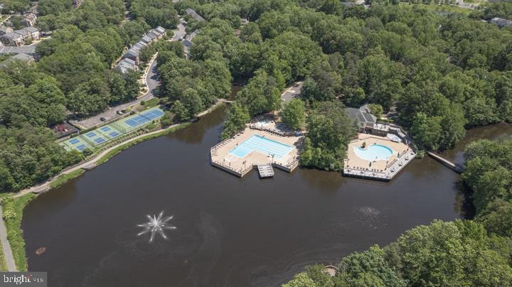 4047 Chetham Way Woodbridge, VA 22192 - Photo 49 of 55 an aerial view of a house with a yard and lake view