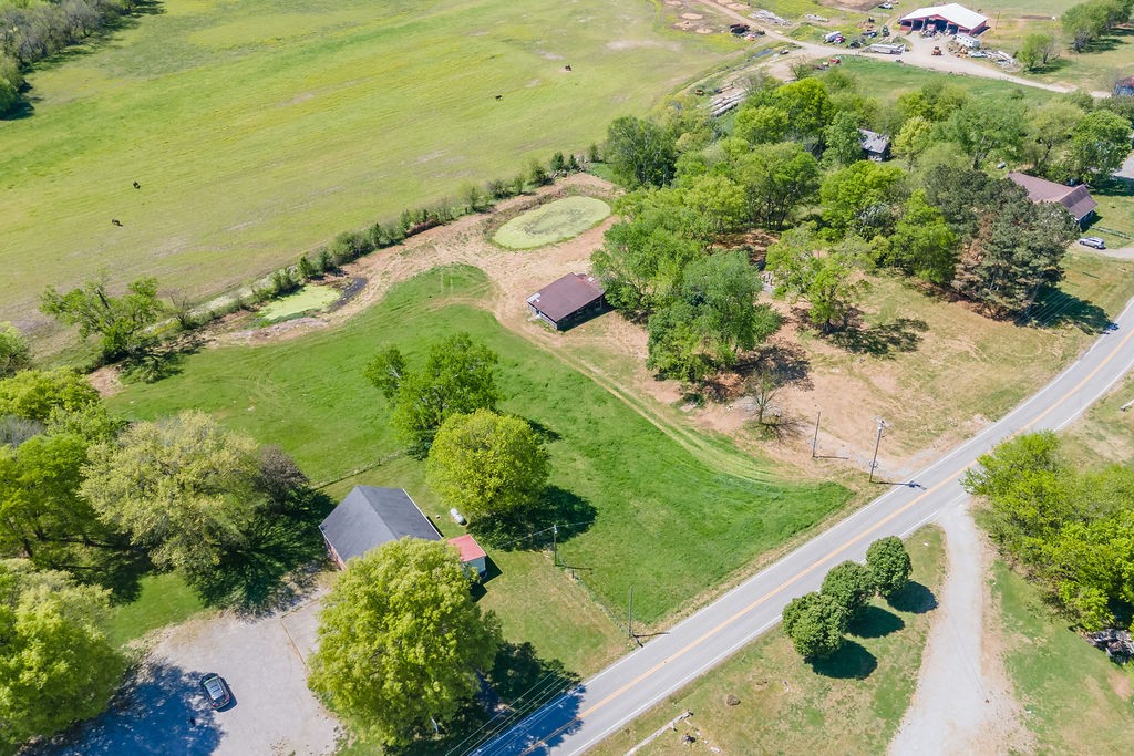 3938 Ostella Road Cornersville, TN 37047 - Photo 11 of 17 a view of a lake with a yard
