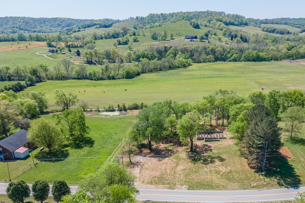 3938 Ostella Road Cornersville, TN 37047 - Photo 12 of 17 an aerial view of a houses with a yard and lake view