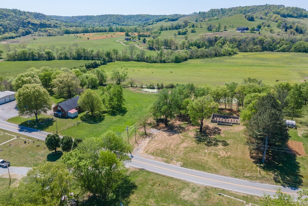 3938 Ostella Road Cornersville, TN 37047 - Photo 13 of 17 an aerial view of a house with a yard
