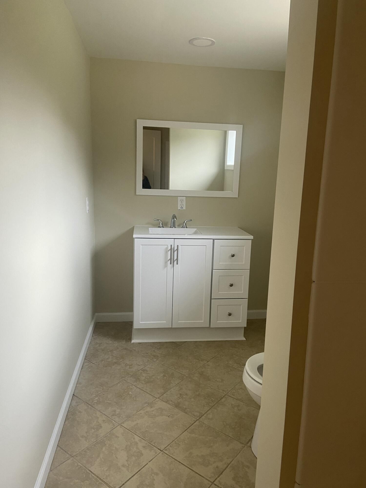 9151 Dallas Hollow Road Soddy Daisy, TN 37379 - Photo 16 of 36 a spacious bathroom with a double vanity sink and mirror