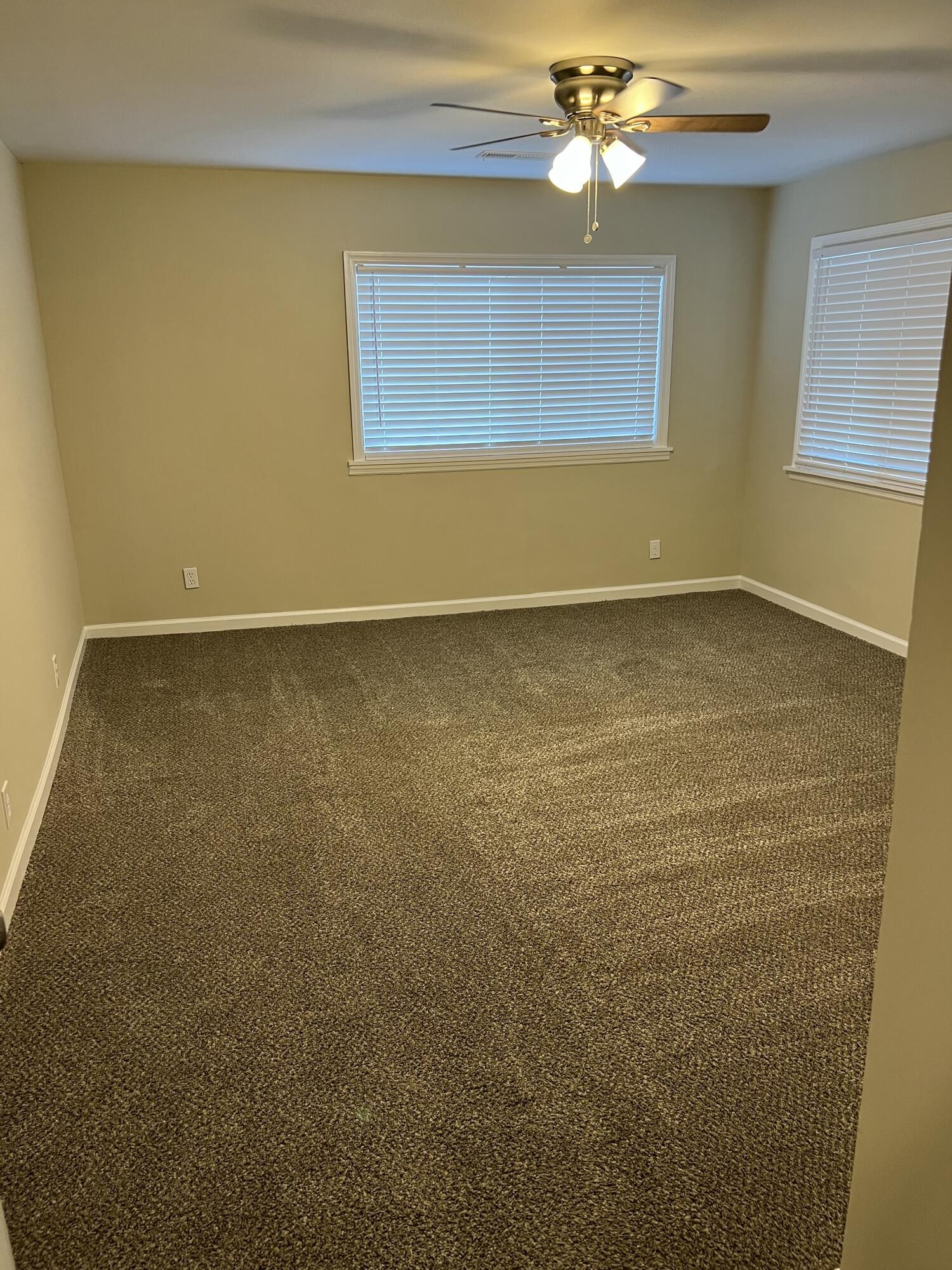 9151 Dallas Hollow Road Soddy Daisy, TN 37379 - Photo 23 of 36 a view of a room with a ceiling fan and wooden floor