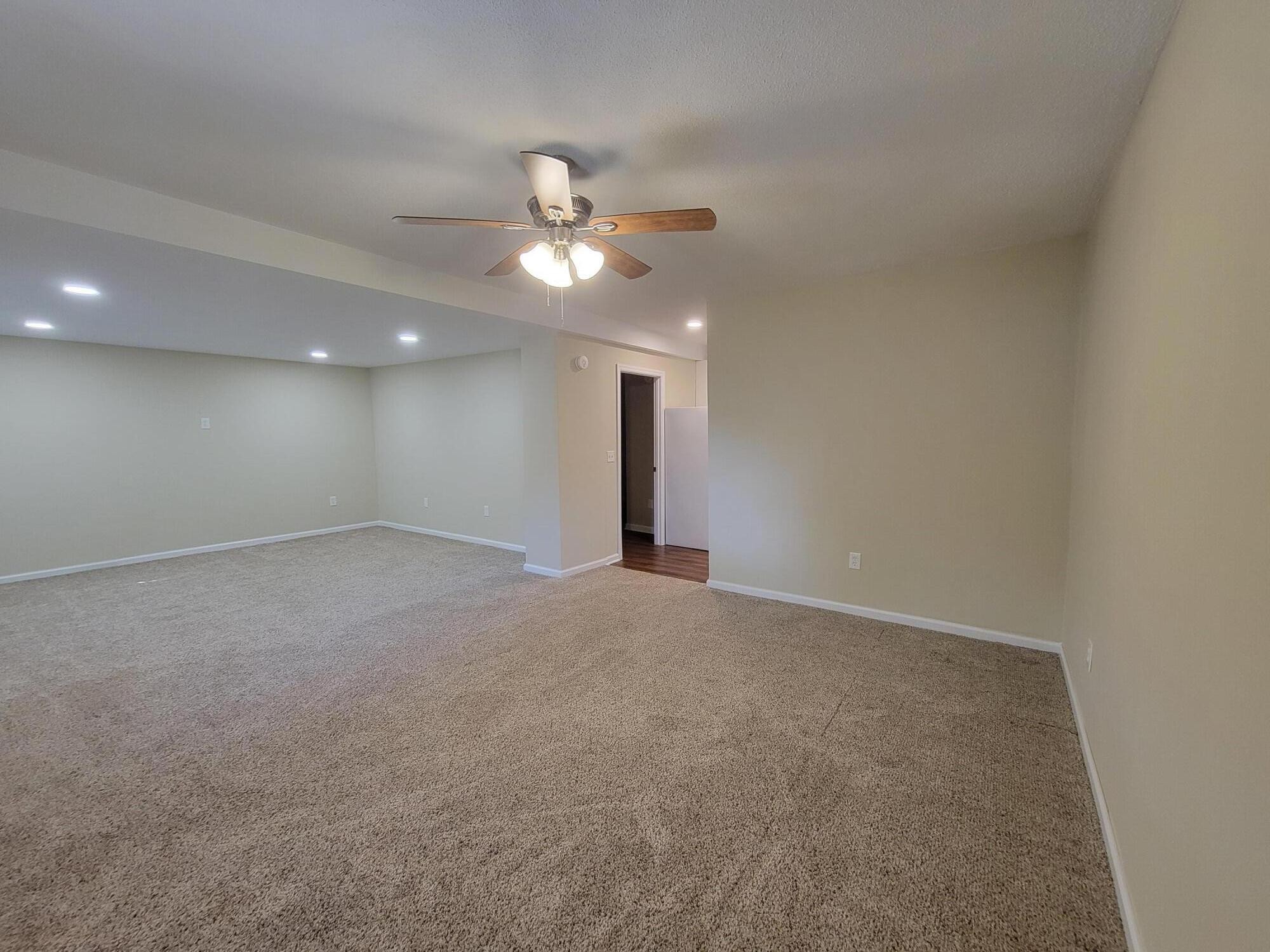 9151 Dallas Hollow Road Soddy Daisy, TN 37379 - Photo 27 of 36 a view of an empty room with a ceiling fan
