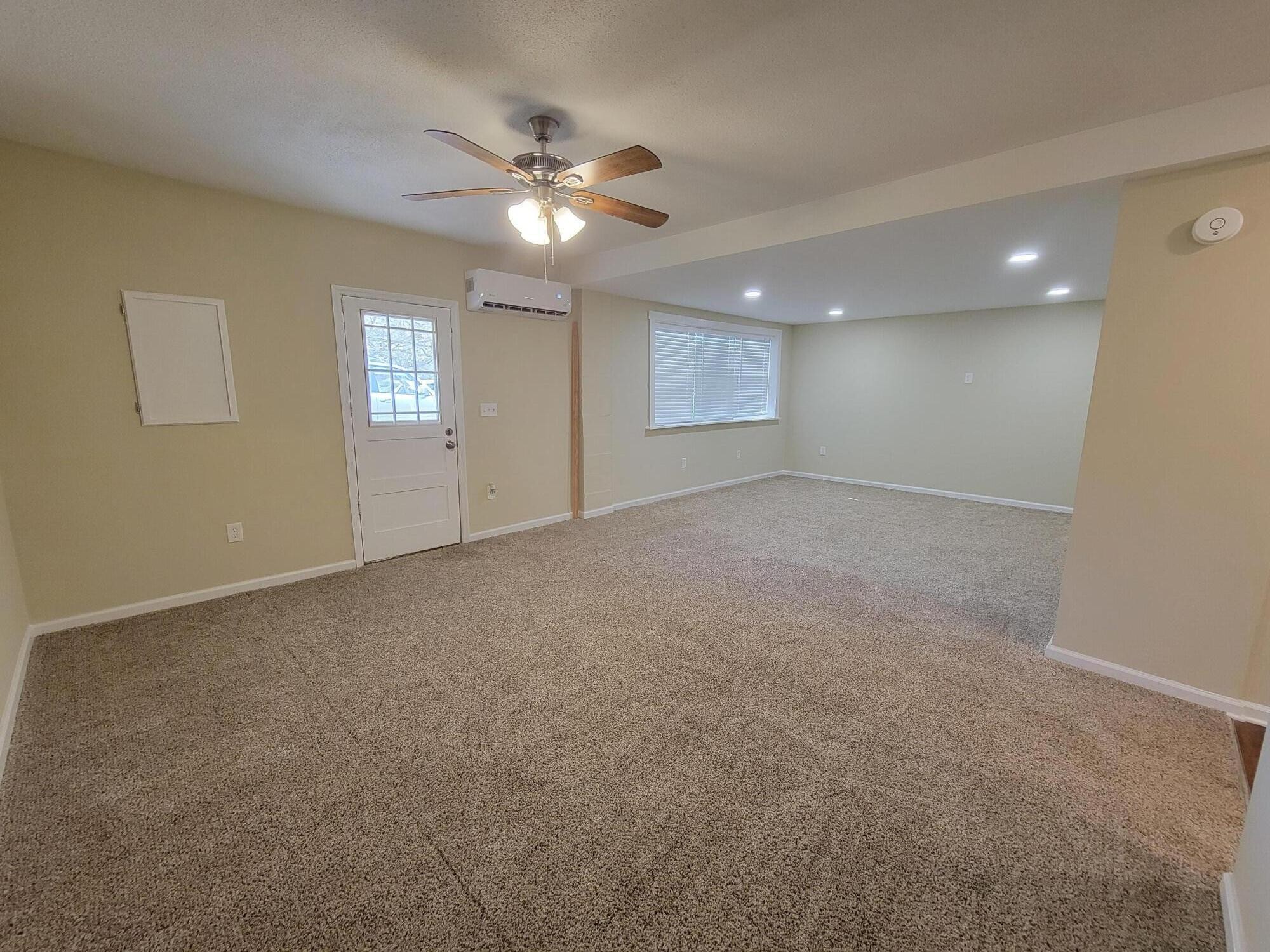 9151 Dallas Hollow Road Soddy Daisy, TN 37379 - Photo 29 of 36 a view of an empty room with a chandelier fan