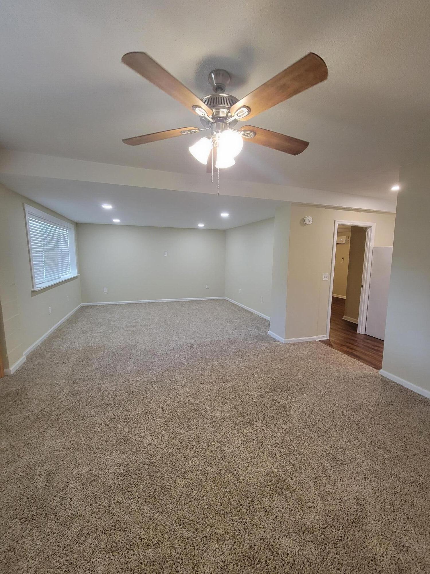 9151 Dallas Hollow Road Soddy Daisy, TN 37379 - Photo 34 of 36 a view of an empty room and a ceiling fan