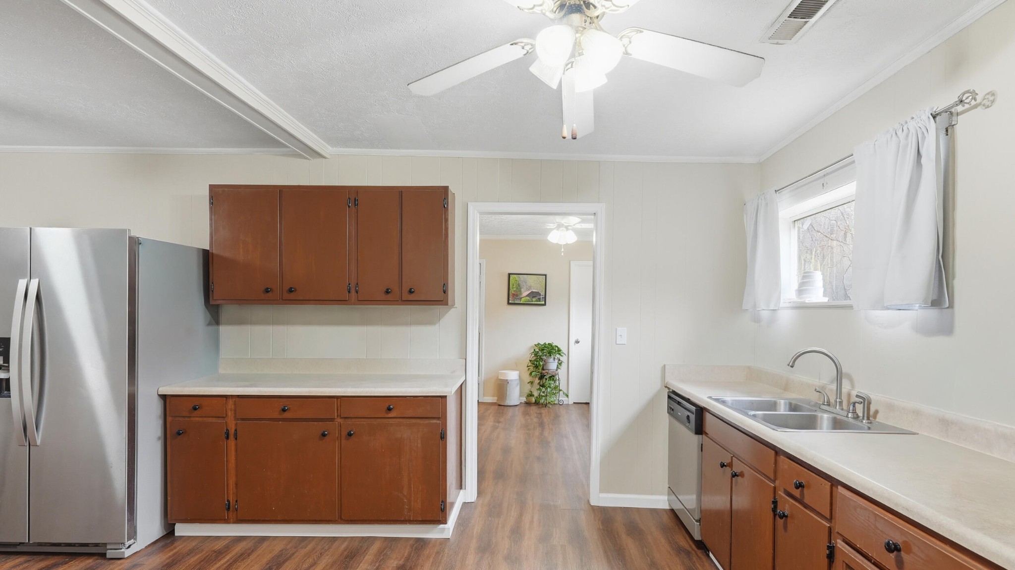 9151 Dallas Hollow Road Soddy Daisy, TN 37379 - Photo 6 of 36 a kitchen with stainless steel appliances granite countertop a sink stove and refrigerator