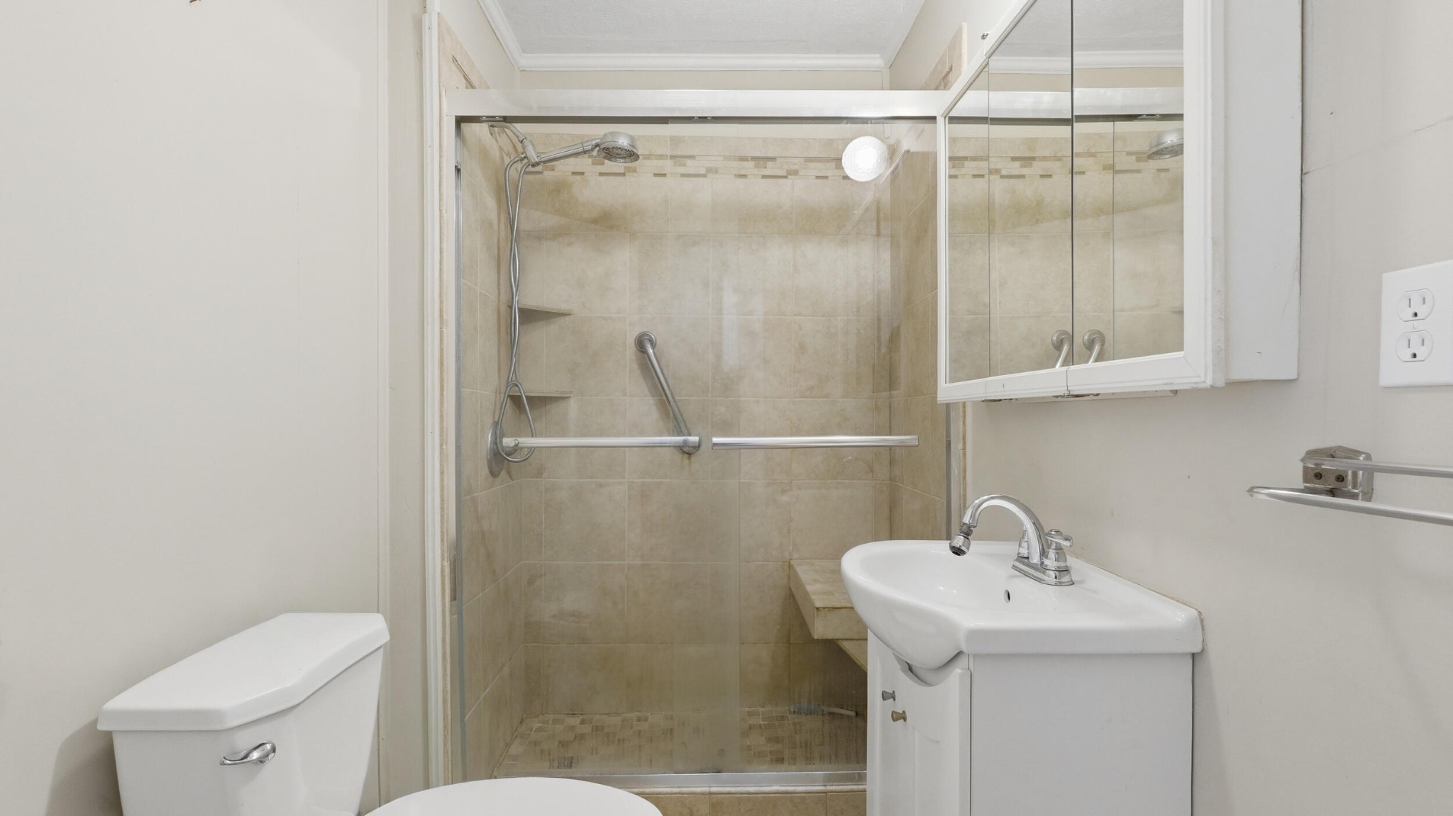 9151 Dallas Hollow Road Soddy Daisy, TN 37379 - Photo 9 of 36 a bathroom with a sink a toilet and shower
