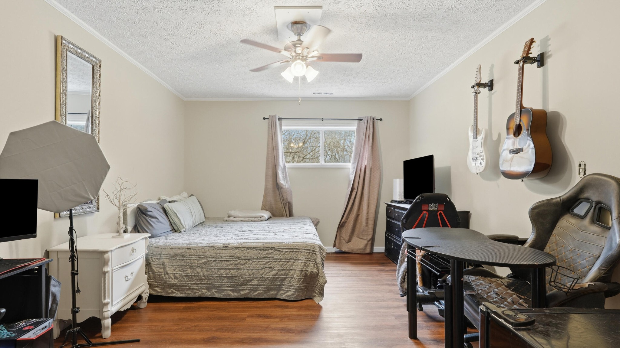 9151 Dallas Hollow Road Soddy Daisy, TN 37379 - Photo 10 of 36 a bedroom with furniture and a flat screen tv