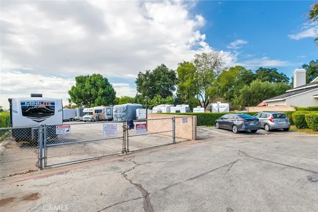 a view of a patio with swimming pool
