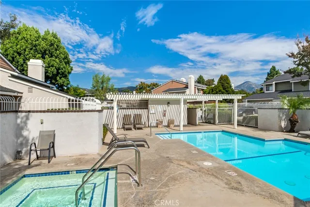 a view of road with a house in the background