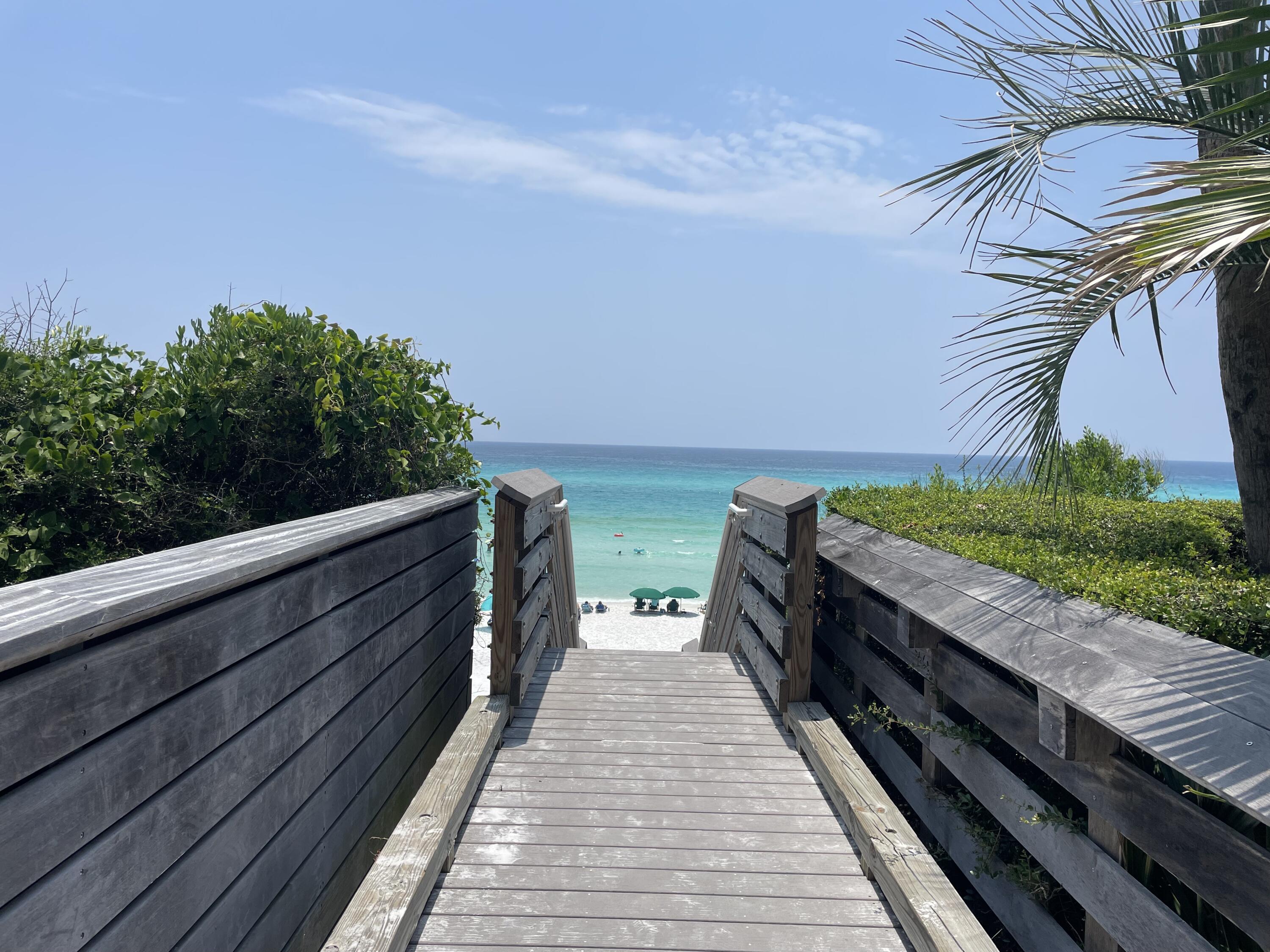 0 West Wild Blueberry Way Santa Rosa Beach, FL 32459 - Photo 18 of 19 a view of a balcony with two chairs