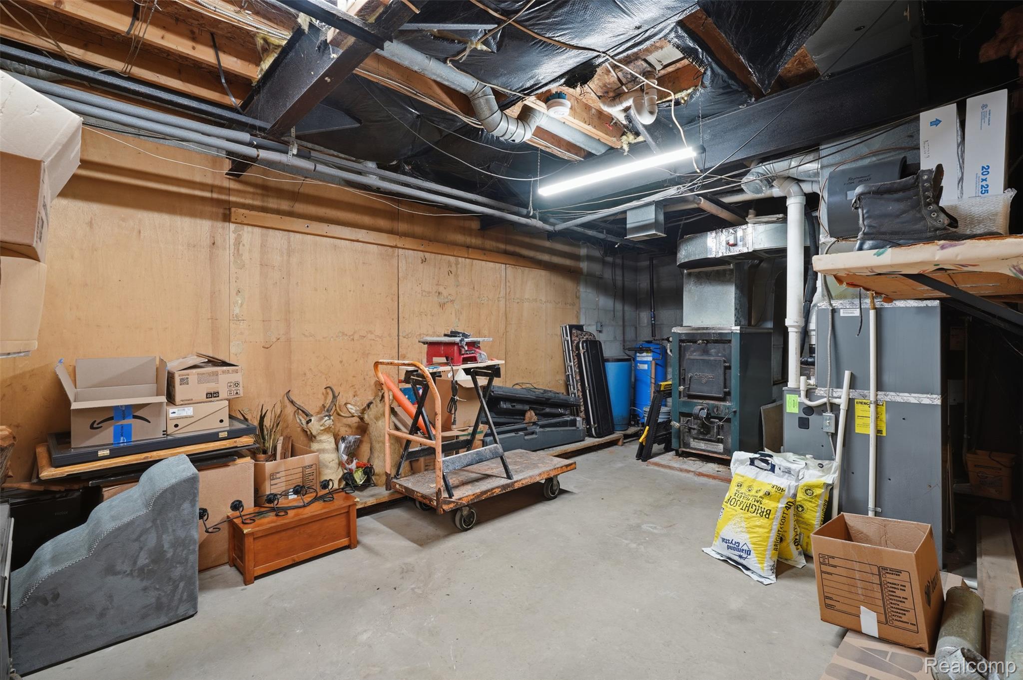 3167 Roods Lake Road Lapeer, MI 48446 - Photo 22 of 38 Mechanical room or storage area in basement.