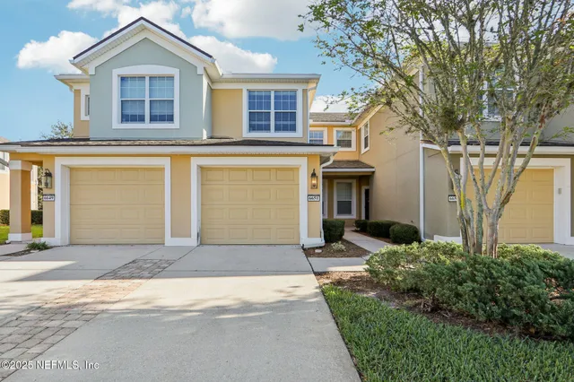 a view of backyard with front door
