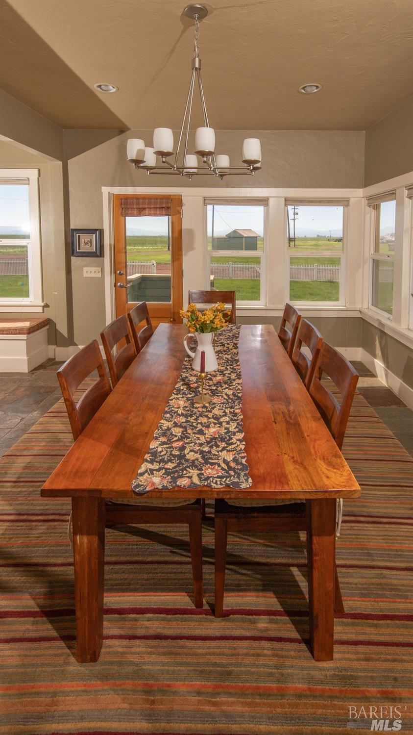 42369 Horr Road Fall River Mills, CA 96028 - Photo 14 of 43 a view of a room with furniture window and wooden floor