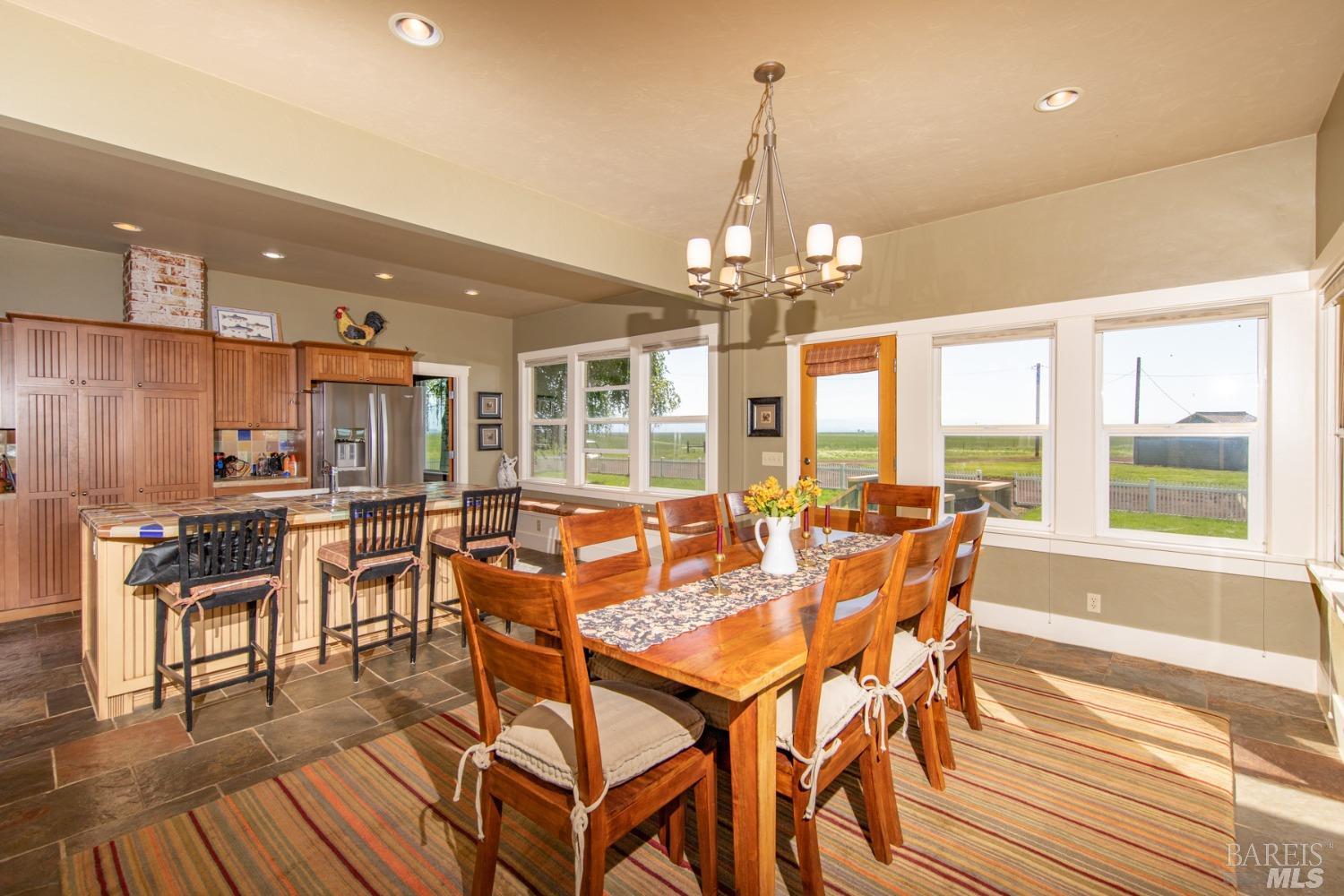 42369 Horr Road Fall River Mills, CA 96028 - Photo 15 of 43 a view of a dining room with furniture window and outside view