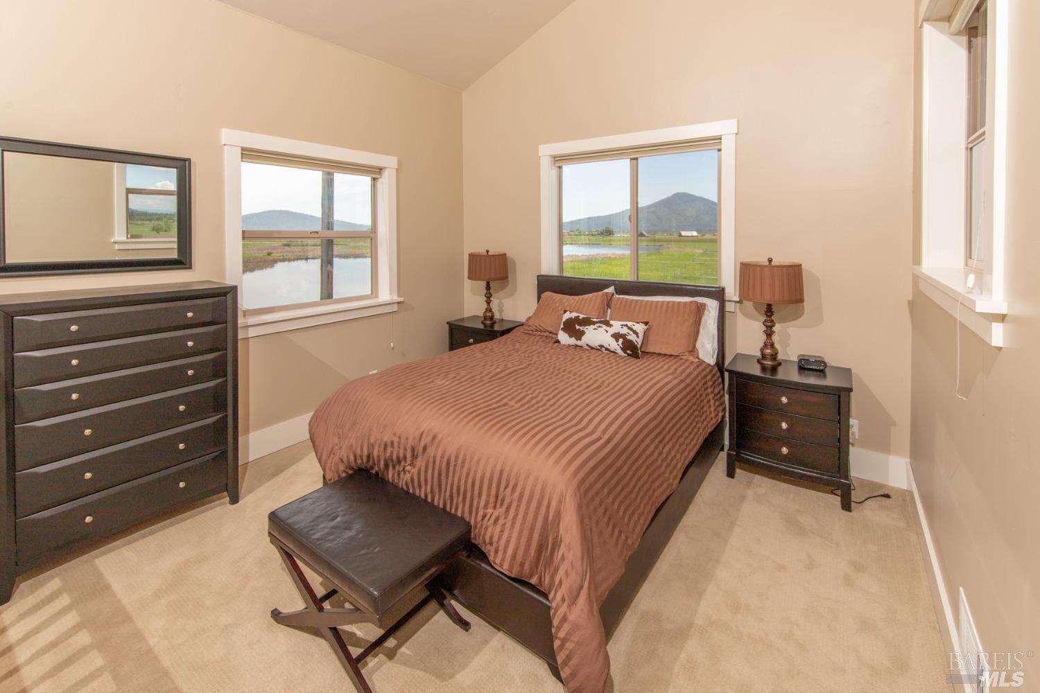 42369 Horr Road Fall River Mills, CA 96028 - Photo 28 of 43 a bedroom with a bed and a window