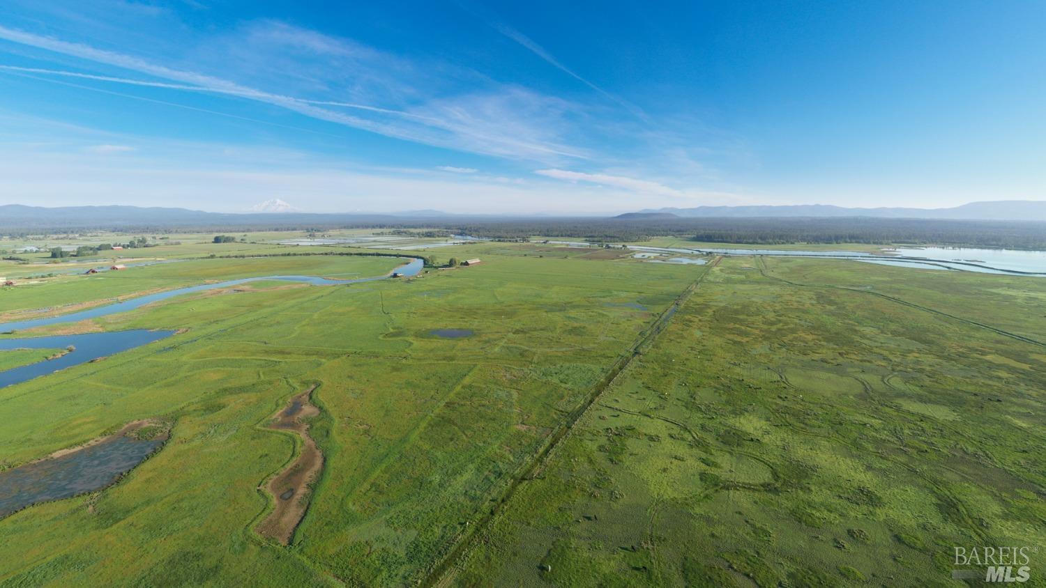 42369 Horr Road Fall River Mills, CA 96028 - Photo 6 of 43 a view of an ocean and a yard