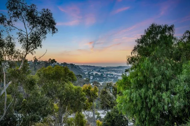 a view of a balcony with furniture