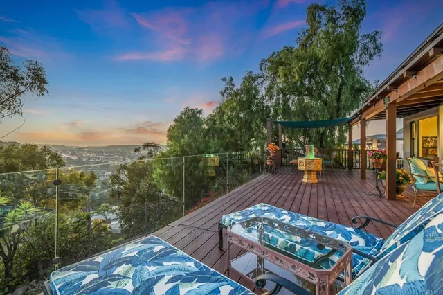 a view of a hallway and wooden floor